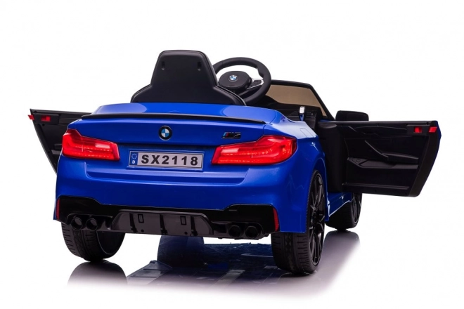 Auto elettrico per bambini BMW M5 blu