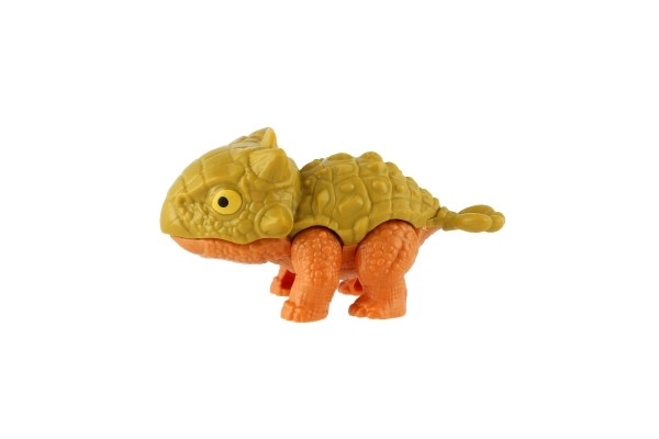 Dinosauro mordente nell'uovo plastica 10 cm vari colori