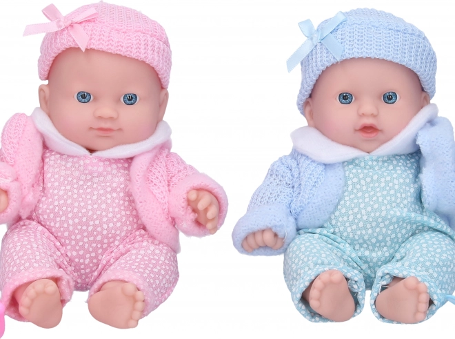 Bambola neonata con accessori