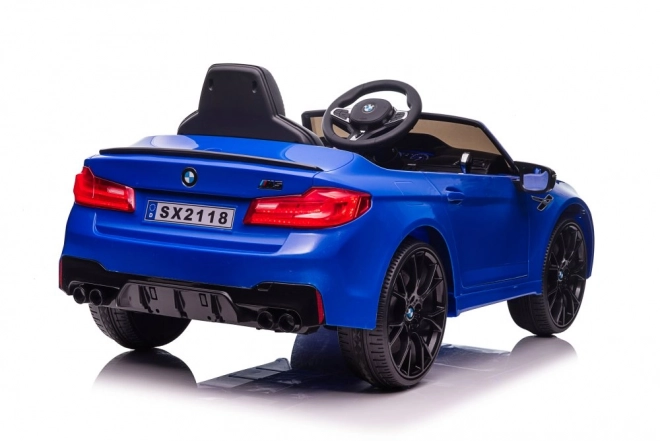 Auto elettrico per bambini BMW M5 blu