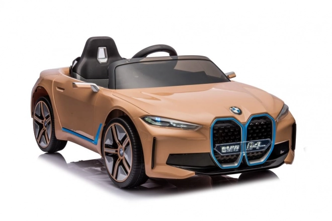 Auto a batteria BMW I4 dorato 4x4