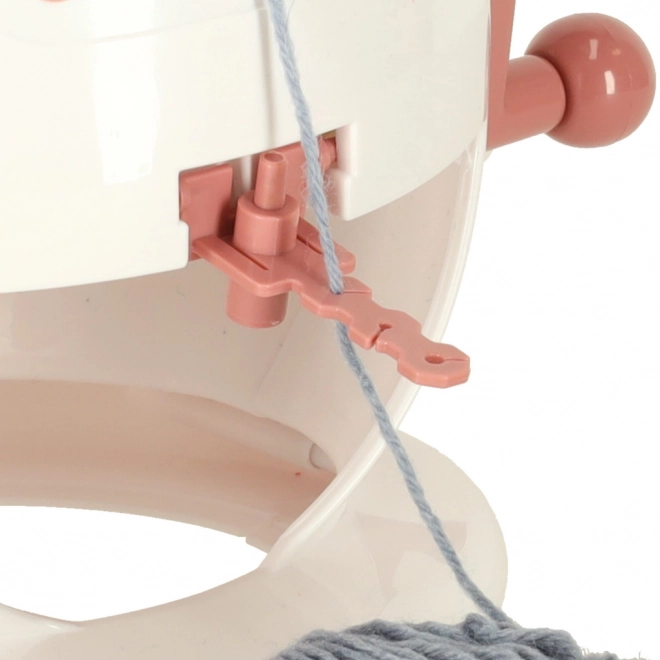 Macchina per maglieria con telaio e 22 aghi