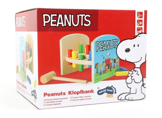 Zatloukačka in legno con Peanuts