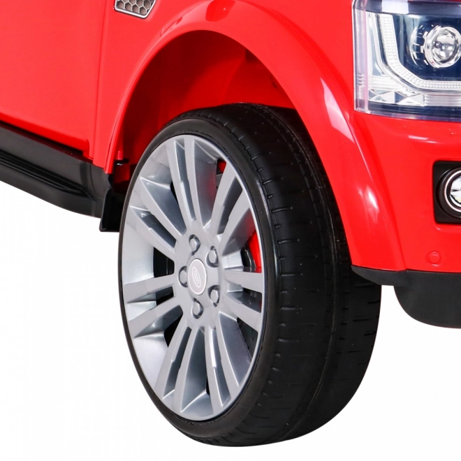 Land Rover Discovery Macchinina elettrica per bambini rossa + telecomando + ruote in EVA + avvio lento + radio MP3