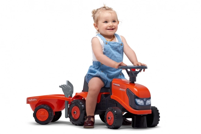 Trattore a pedali per bambini Kubota con rimorchio e accessori