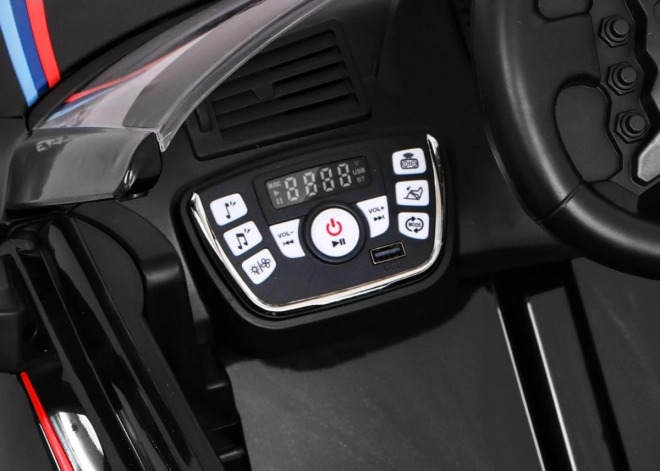BMW M6 GT3 Auto a batteria per bambini nero + ventilazione + suoni MP3 Luci + telecomando