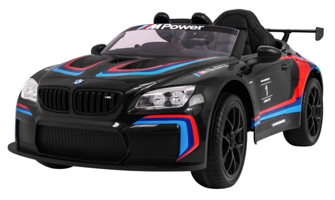 BMW M6 GT3 Auto a batteria per bambini nero + ventilazione + suoni MP3 Luci + telecomando