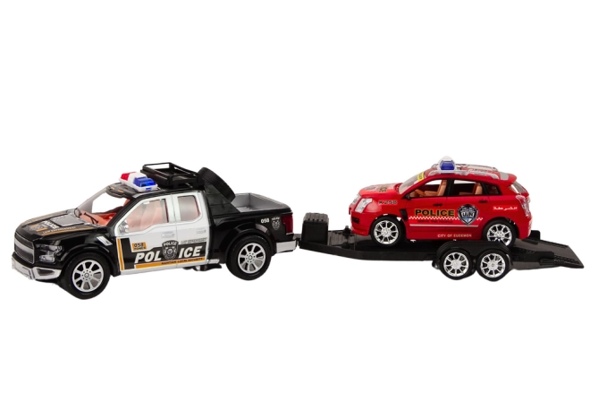 Due veicoli della polizia con rimorchio da traino