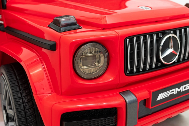 Mercedes AMG G63 per bambini Rosso + telecomando + MP3 LED + avvio lento + EVA + cinture