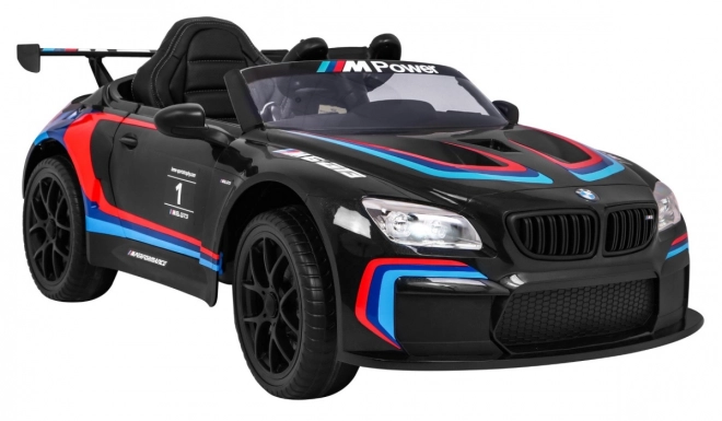 BMW M6 GT3 Auto a batteria per bambini nero + ventilazione + suoni MP3 Luci + telecomando