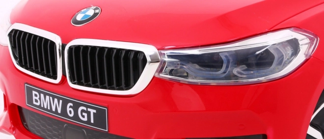 BMW 6 GT Auto a batteria rosso + telecomando + partenza lenta + EVA + cinture + LED MP3