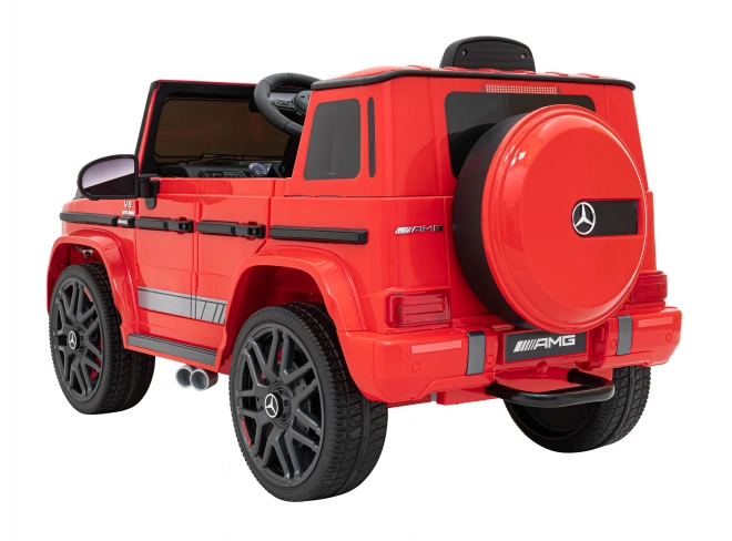 Mercedes AMG G63 per bambini Rosso + telecomando + MP3 LED + avvio lento + EVA + cinture