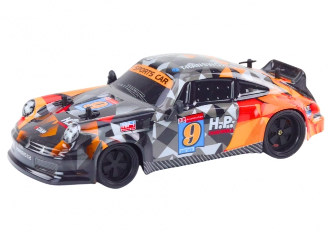 Auto telecomandata RC Drift con gomme arancione 1:18