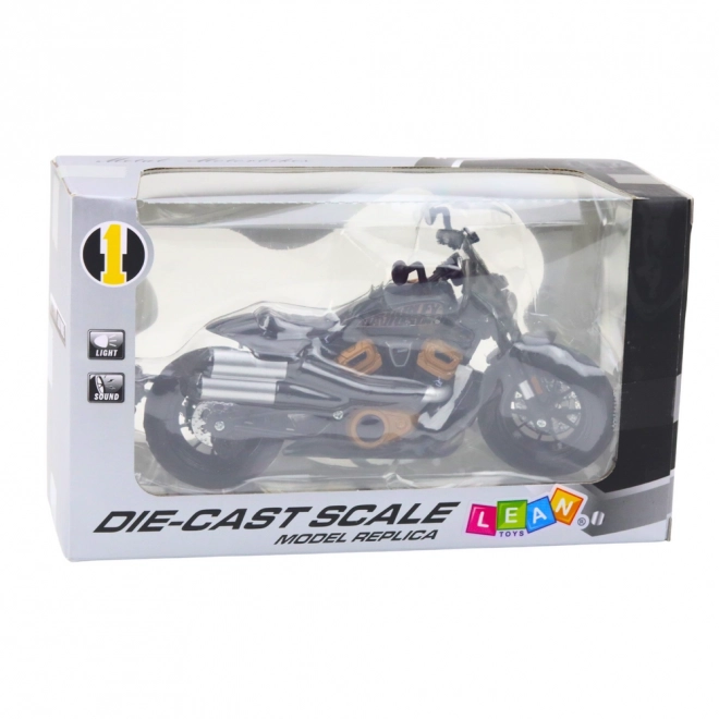 Moto chopper nero con dettagli dorati 1:12