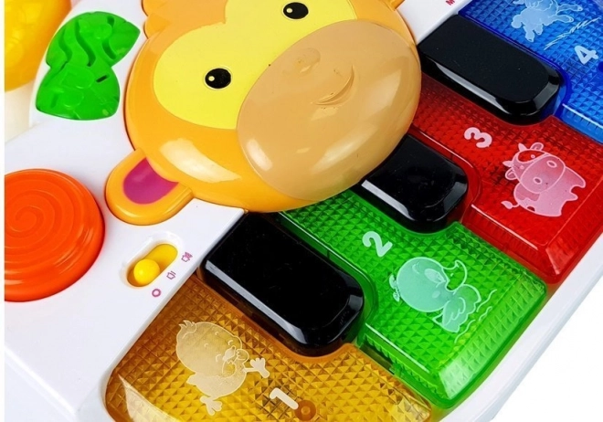 Giocattolo pianola con scimmietta per neonati