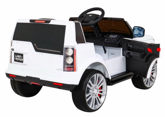 Land Rover Discovery Auto elettrico per bambini bianco + telecomando + ruote EVA + avvio lento + radio MP3
