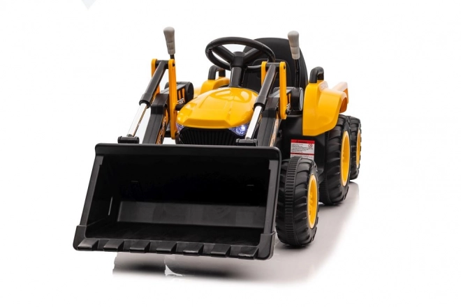 Trattore a batteria con pala gialla