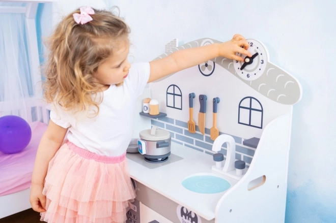 Cucina in legno grigia con luce e accessori per bambini