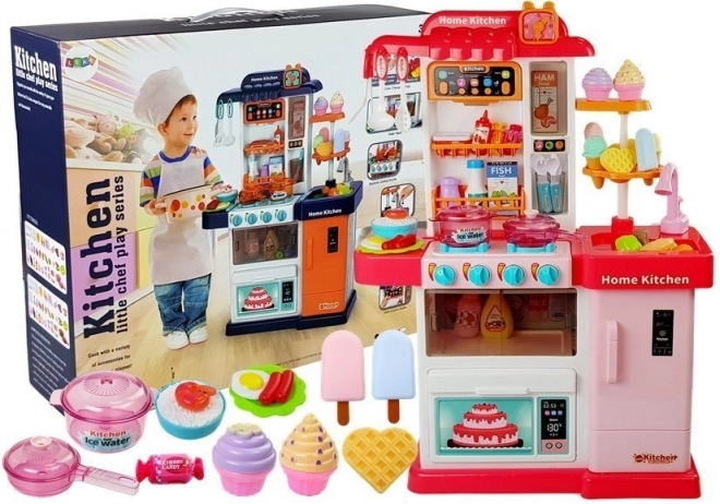 Cucina musicale con luci e acqua rosa