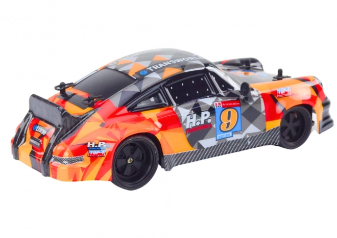 Auto telecomandata RC Drift con gomme arancione 1:18