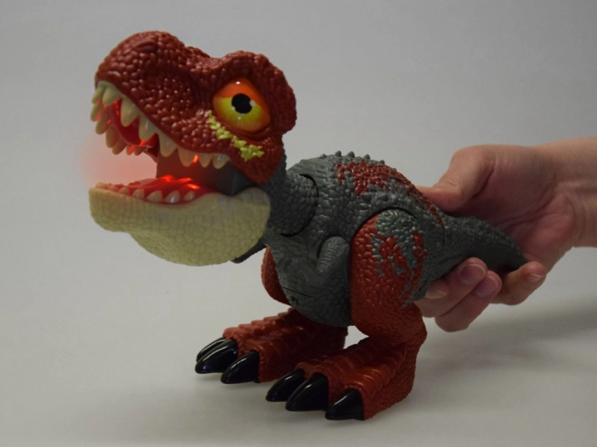 Dinosauro Tirannosauro Rex con parti mobili ed effetti sonori e luminosi