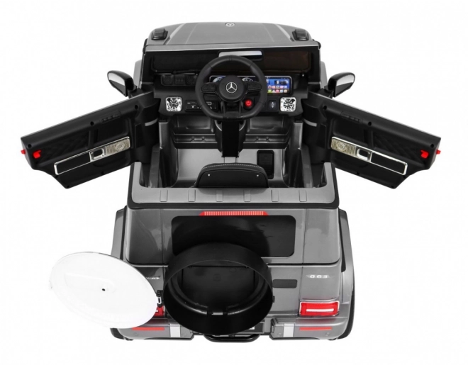 Mercedes AMG G63 per bambini Vernice argento + telecomando + MP3 LED + avvio lento + EVA + cinture