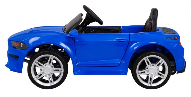 GT Macchina sportiva giocattolo a batteria per bambini blu + telecomando + partenza lenta + portapacchi + LED MP3