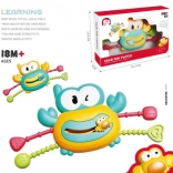 Giocattolo interattivo sensoriale a forma di granchio per bambini dai 18 mesi