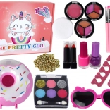 Set trucco per bambine con smalti, ombretti e accessori in box a donut