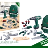 Zainetto del piccolo tuttofare con attrezzi e trapano