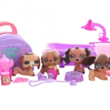 set di cagnolini con accessori per il gioco e la cura