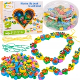 Perline di legno su cordoncino coccinella