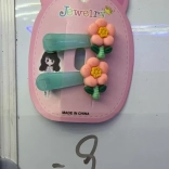 Fermaglio per capelli con fiore arancione