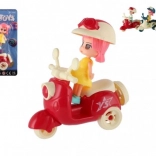 Bambola sul motorino con casco in vari colori